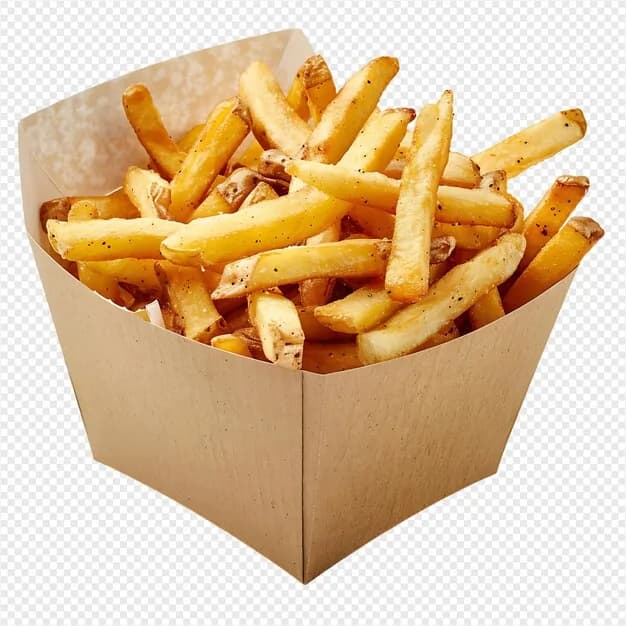 Crispy french fries in a paper sleeve