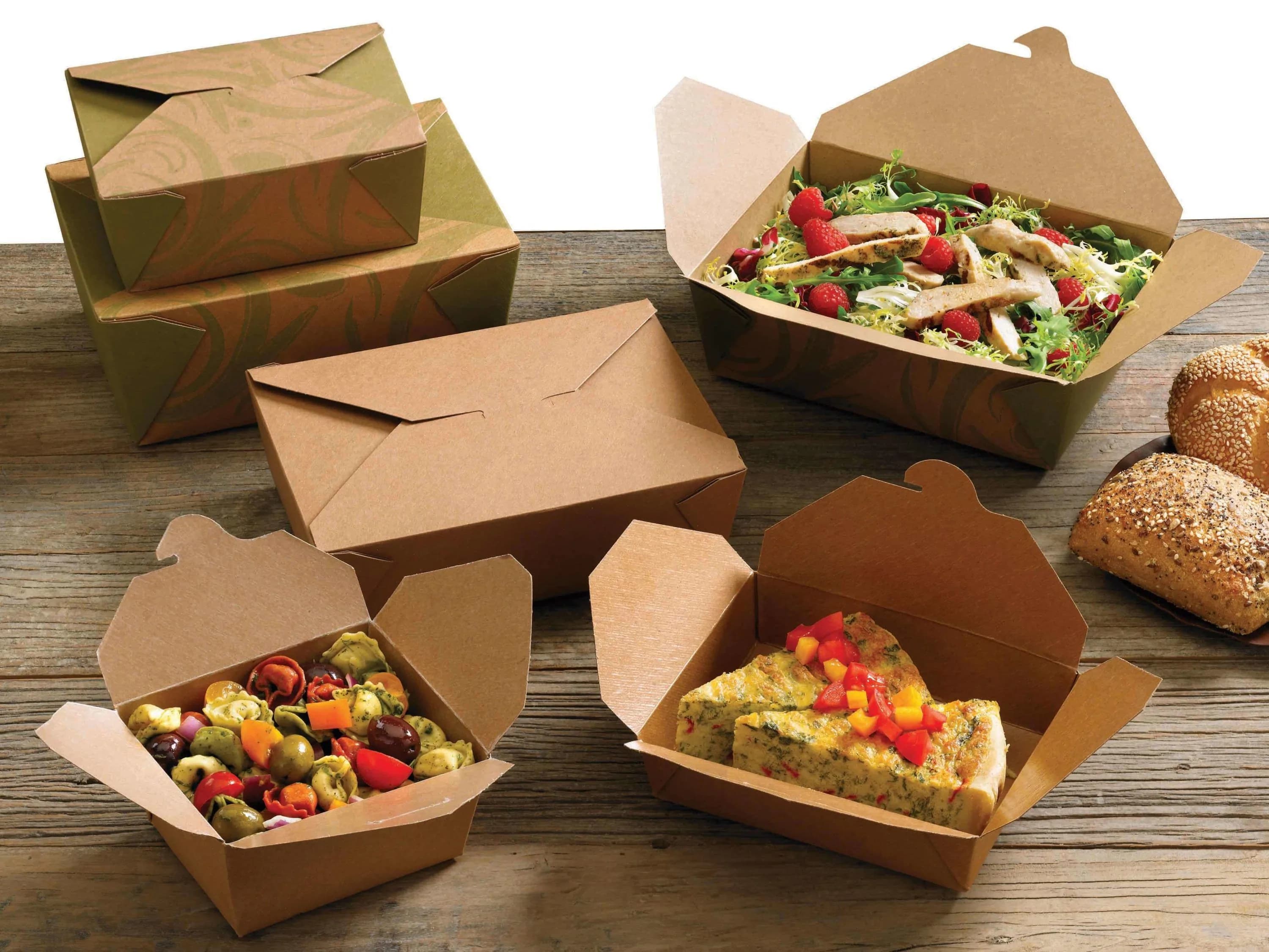 Overhead view of assorted dishes and takeout food spread